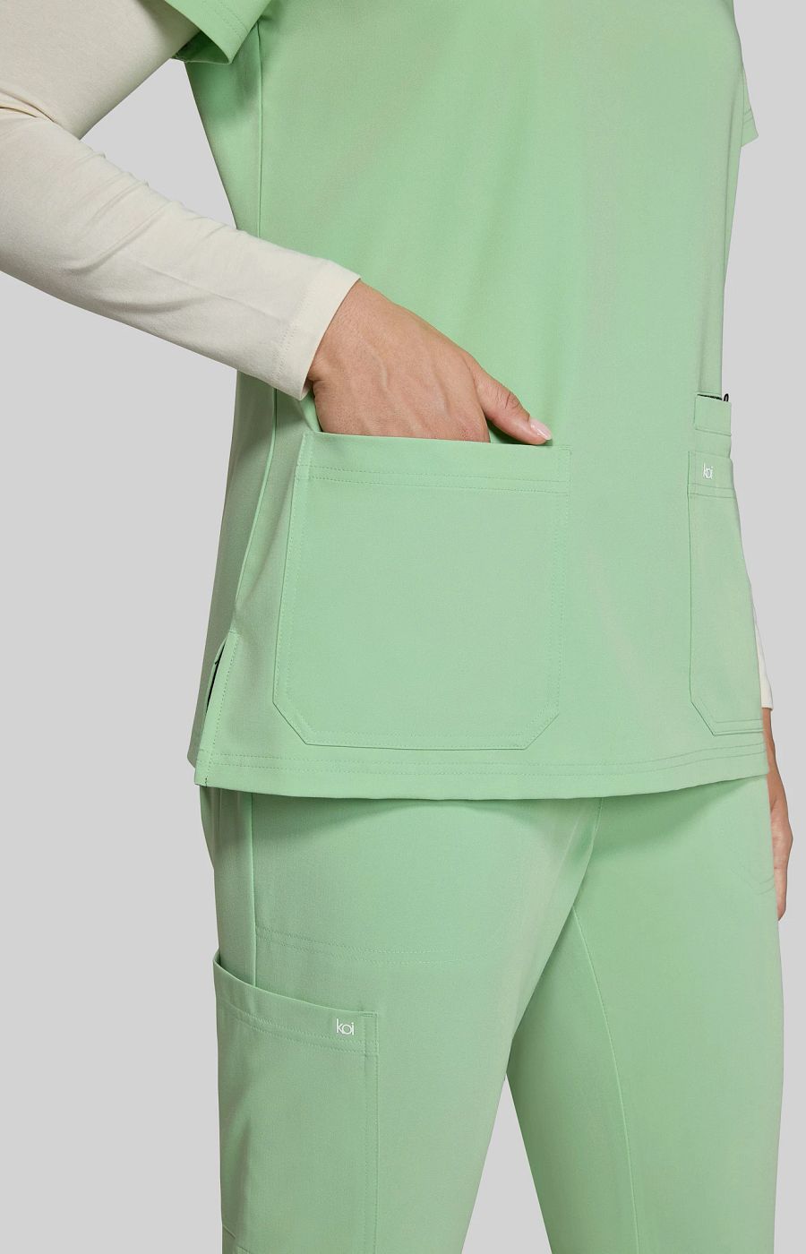 Next Gen Hustle and Heart Women's 3-Pocket Stretch Scrub Top Pistachio