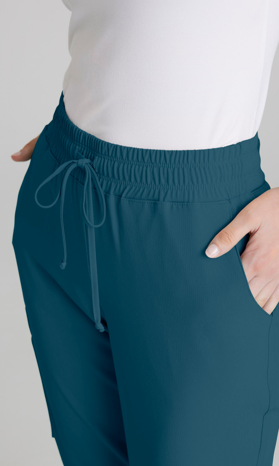 Skechers SKP552 Theory Jogger Bahama