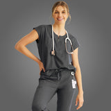 person wearing pewter grey nursing scrubs