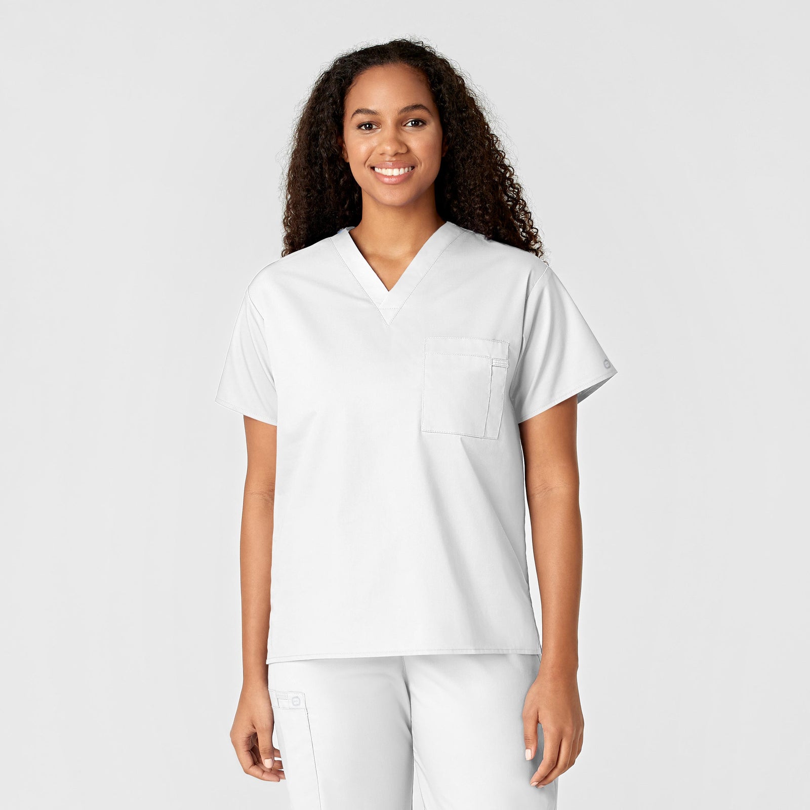 WonderWORK 100 Unisex V-Neck Scrub Top White Model Image Front | Wink