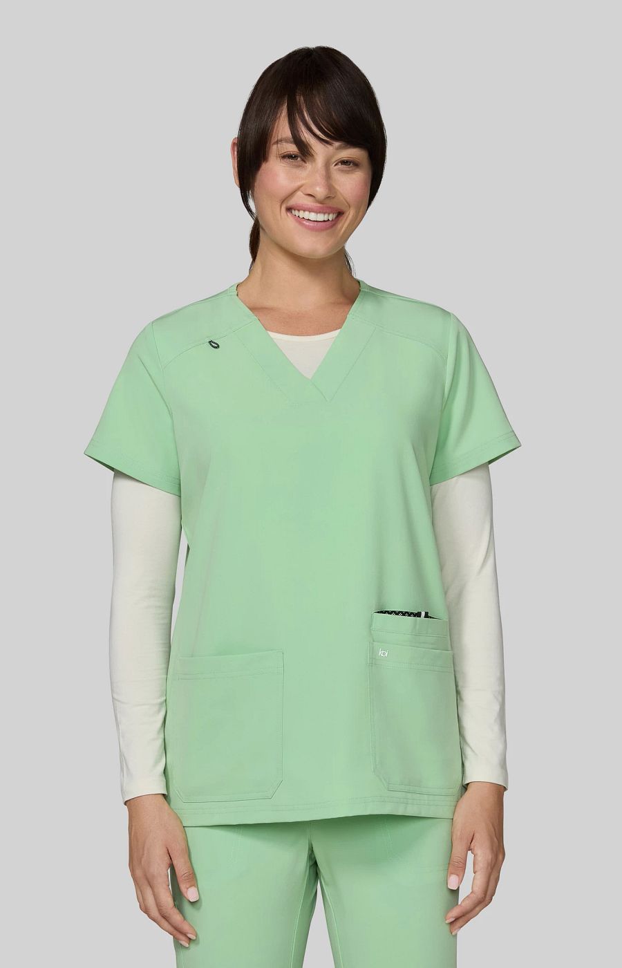 Next Gen Hustle and Heart Women's 3-Pocket Stretch Scrub Top Pistachio
