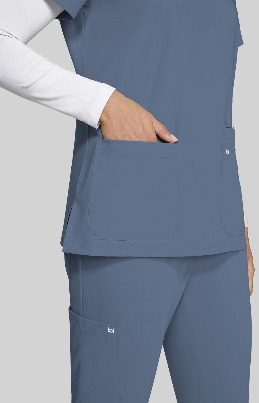 Next Gen Hustle and Heart Women's 3-Pocket Stretch Scrub Top Bluestone