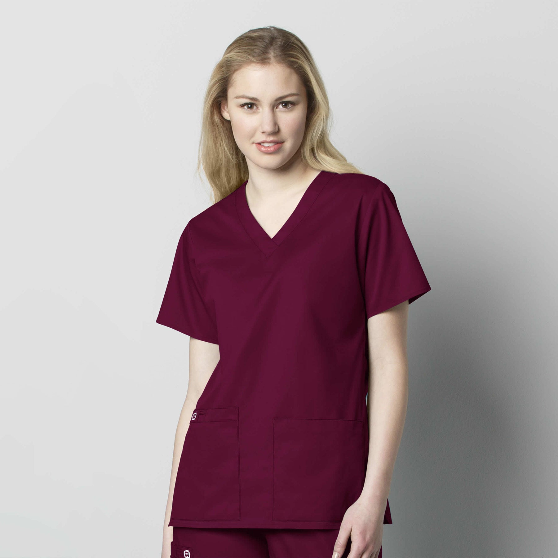 WonderWORK 101 V-Neck Scrub Top Wine Model Image Front | Wink