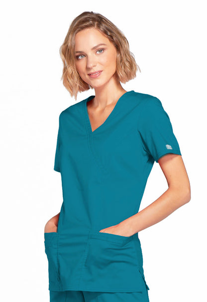 Core Stretch 4728 Mock Wrap Top Caribbean Blue Model Image Right Side | Cherokee Workwear