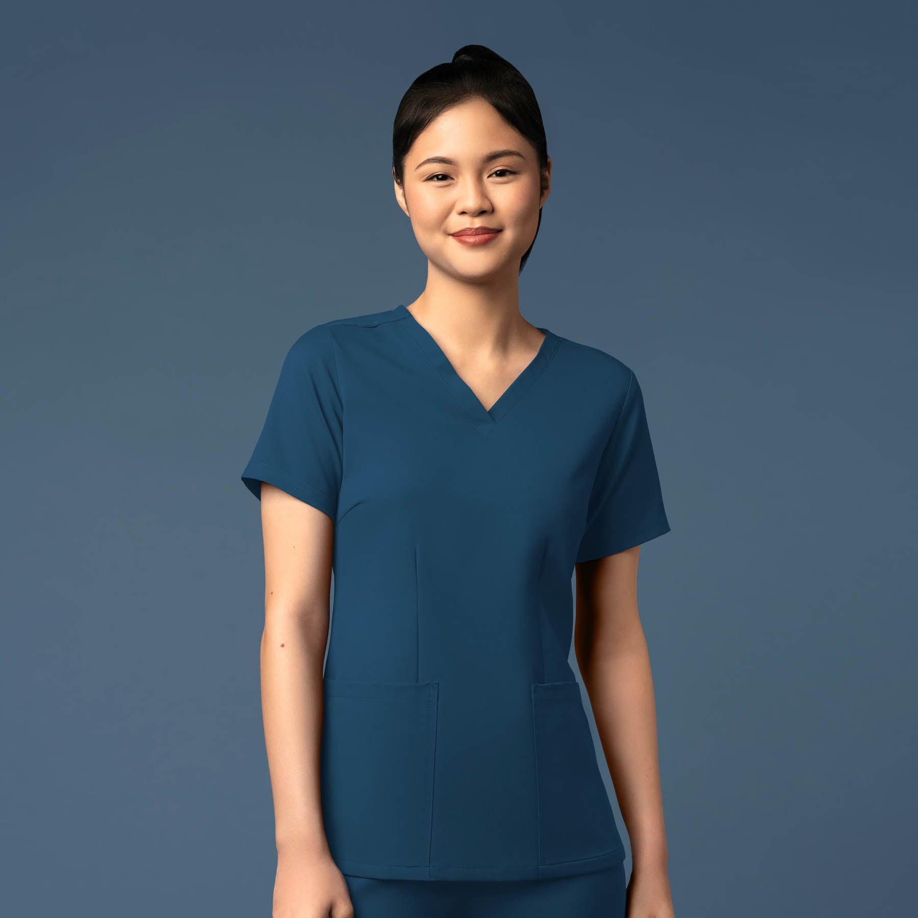 Thrive 6122 Fitted 3-Pocket V-Neck Scrub Top Caribbean Blue Model Image Front | Wink