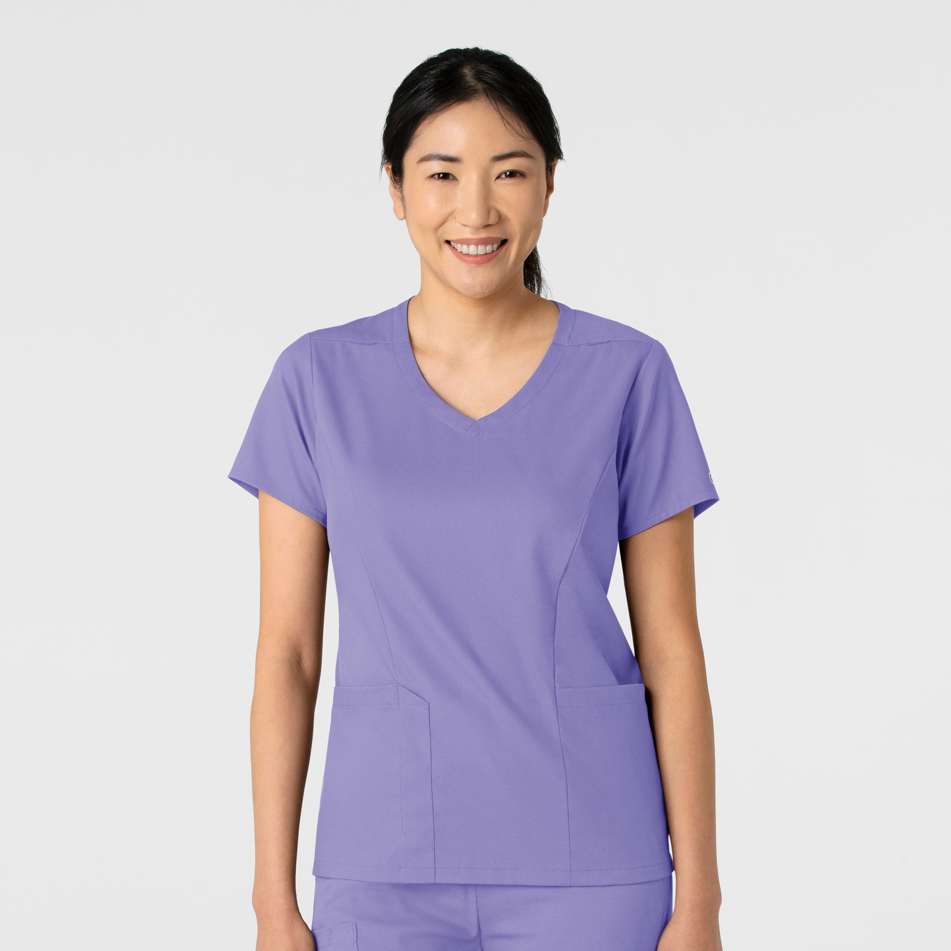 Boundless 6251 2-Pocket V-Neck Scrub Top Iris Purple Model Image Front | Wink