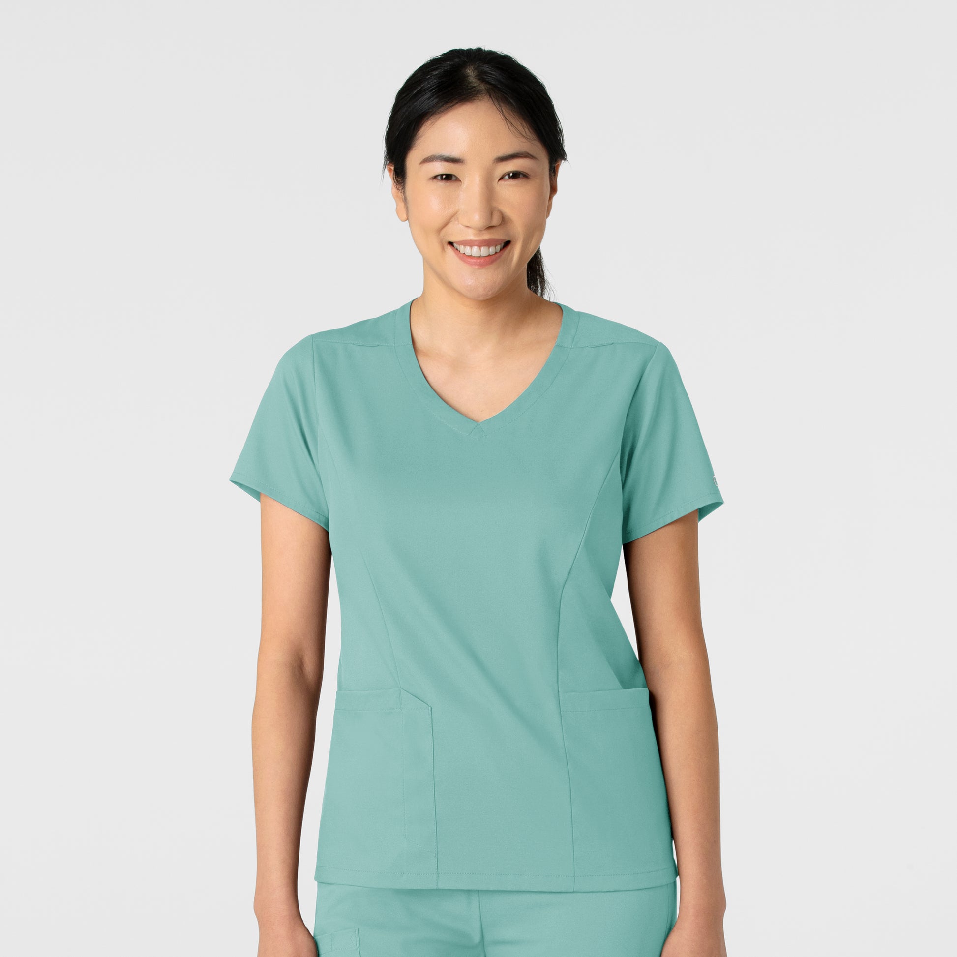 Boundless 6251 2-Pocket V-Neck Scrub Top Turquoise Model Image Front | Wink