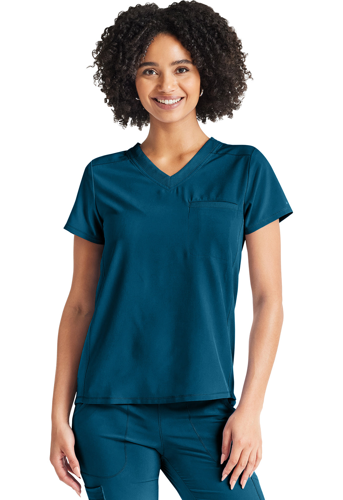 Inspira Flex IP600A V-Neck Tuckable Top Caribbean Blue Model Image Left Side | Inspira