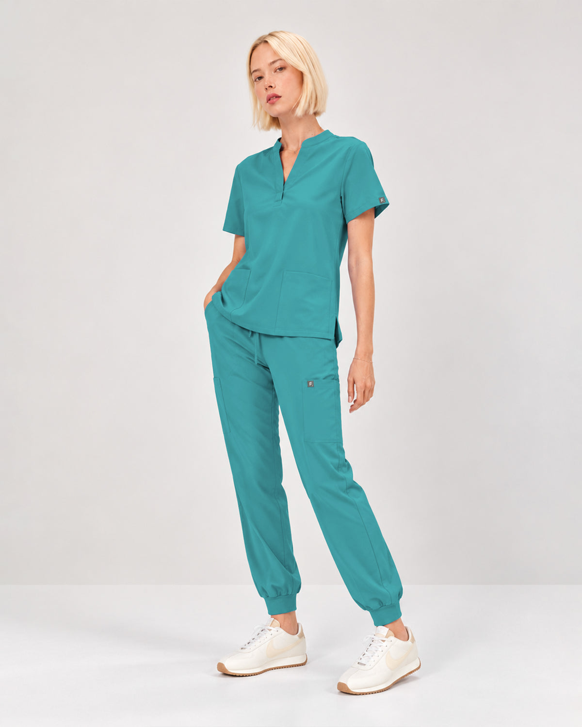 Foundry Women's 1055 Arden 2 Pocket Mandarin Top Teal