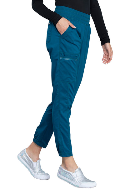 Revolution WW011 Natural Rise Jogger Caribbean Blue Model Image Left Side | Cherokee Workwear