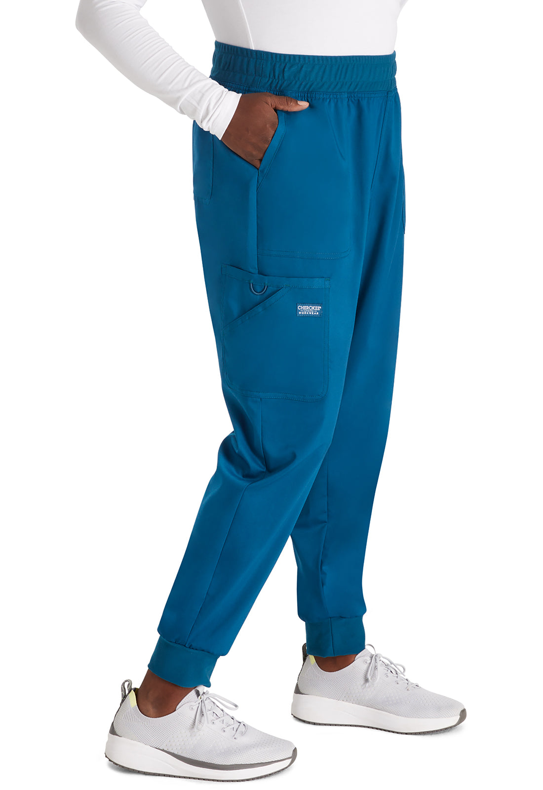 Revolution WW115 Mid Rise Jogger Caribbean Blue Model Image Left Side | Cherokee Workwear