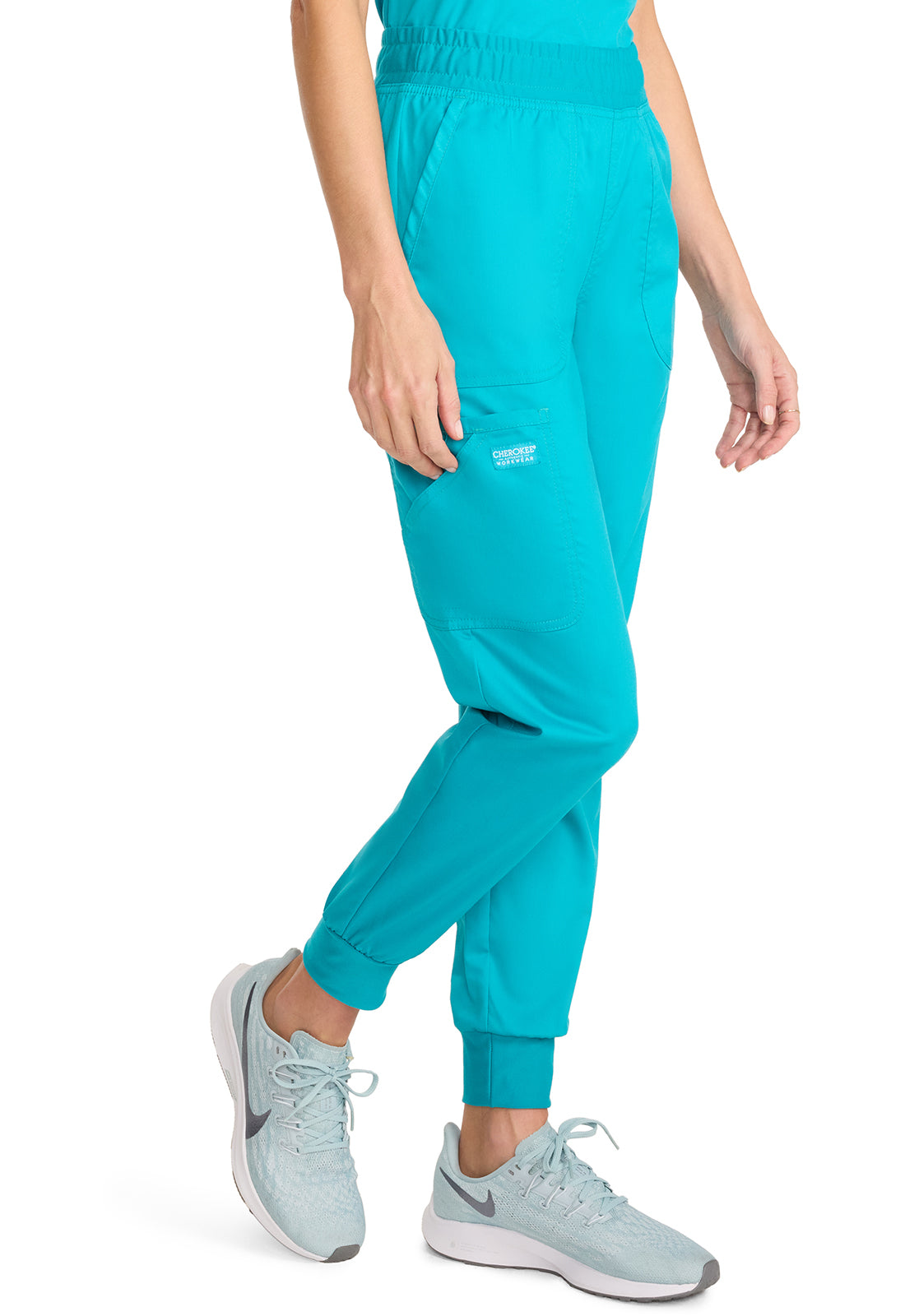 Revolution WW115 Mid Rise Jogger Teal Blue Model Image Left Side | Cherokee Workwear