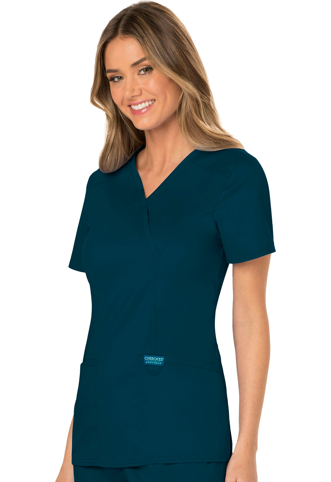 Revolution WW610 Mock Wrap Top Caribbean Blue Model Image Right Side | Cherokee Workwear