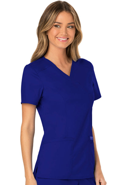 Revolution WW610 Mock Wrap Top Galaxy Blue Model Image Left Side | Cherokee Workwear