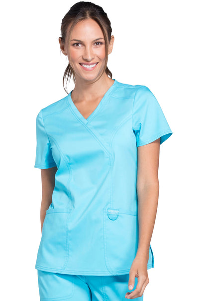 Revolution WW610 Mock Wrap Top Turquoise Model Image Front | Cherokee Workwear