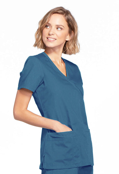 Originals WW650 Mock Wrap Top Caribbean Blue Model Image Left Side | Cherokee Workwear