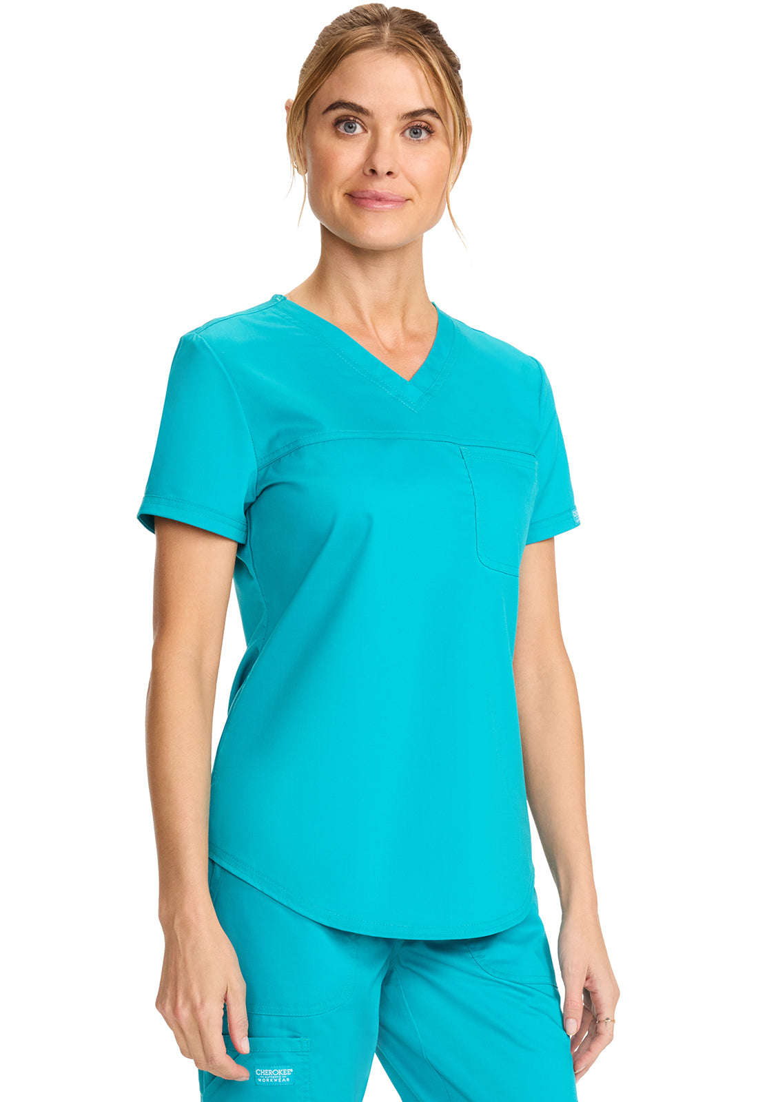 Revolution WW657 Tuckable V-Neck O.R. Top Teal Blue Model Image Left Side | Cherokee Workwear