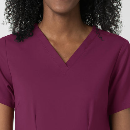 Thrive 6122 Fitted 3-Pocket V-Neck Scrub Top Wine Model Image Left Side | Wink