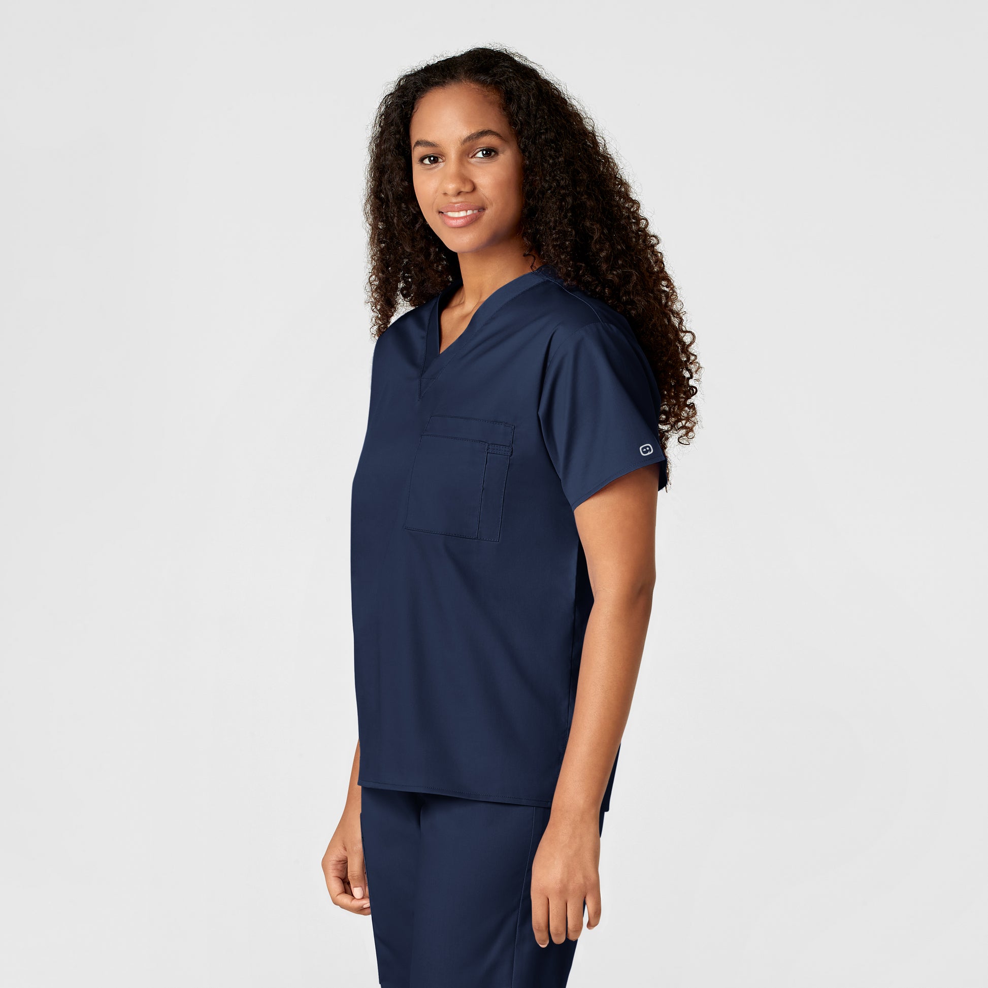 WonderWORK 100 Unisex V-Neck Scrub Top Navy Model Image Left Side | Wink