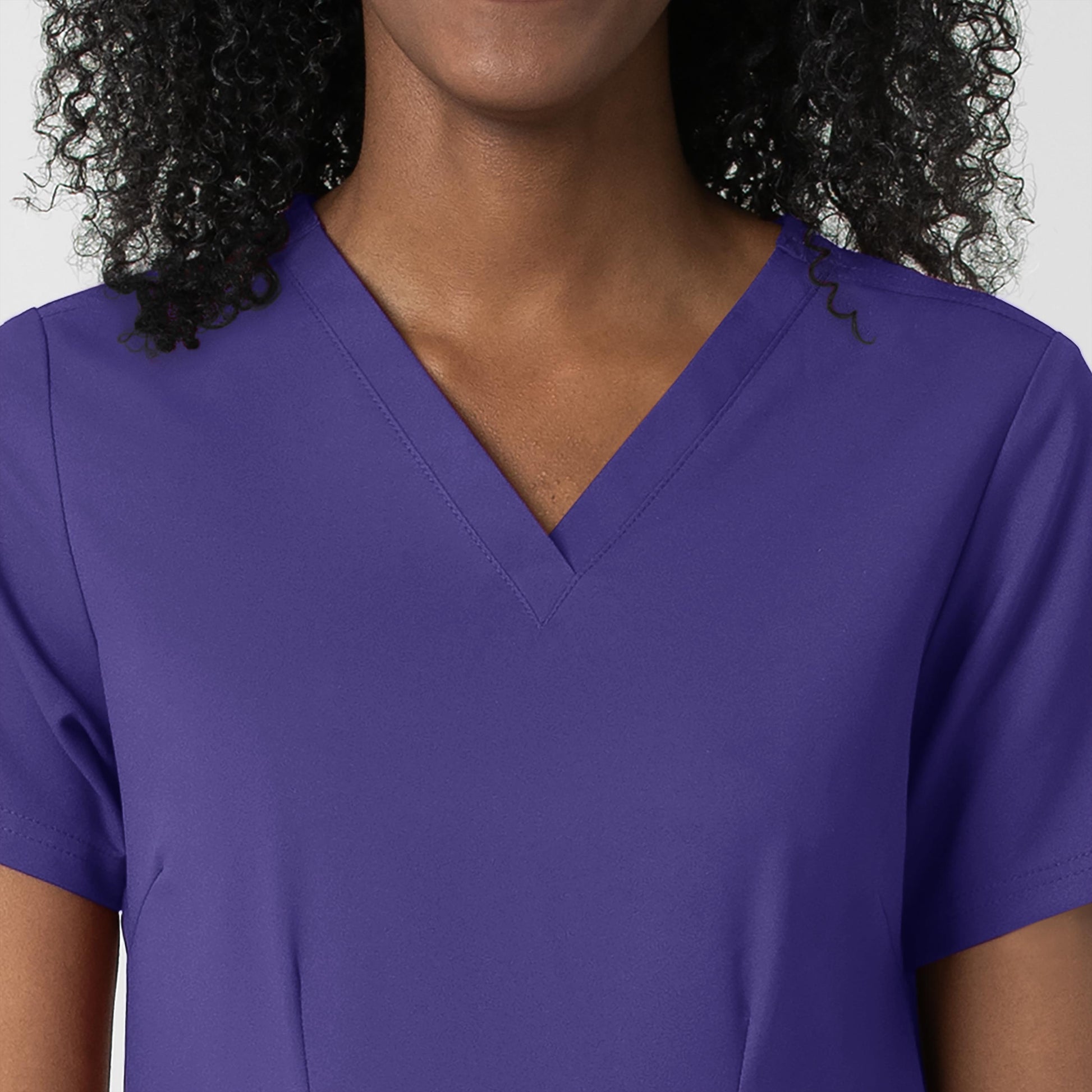 Thrive 6122 Fitted 3-Pocket V-Neck Scrub Top Grape Model Image Left Side | Wink