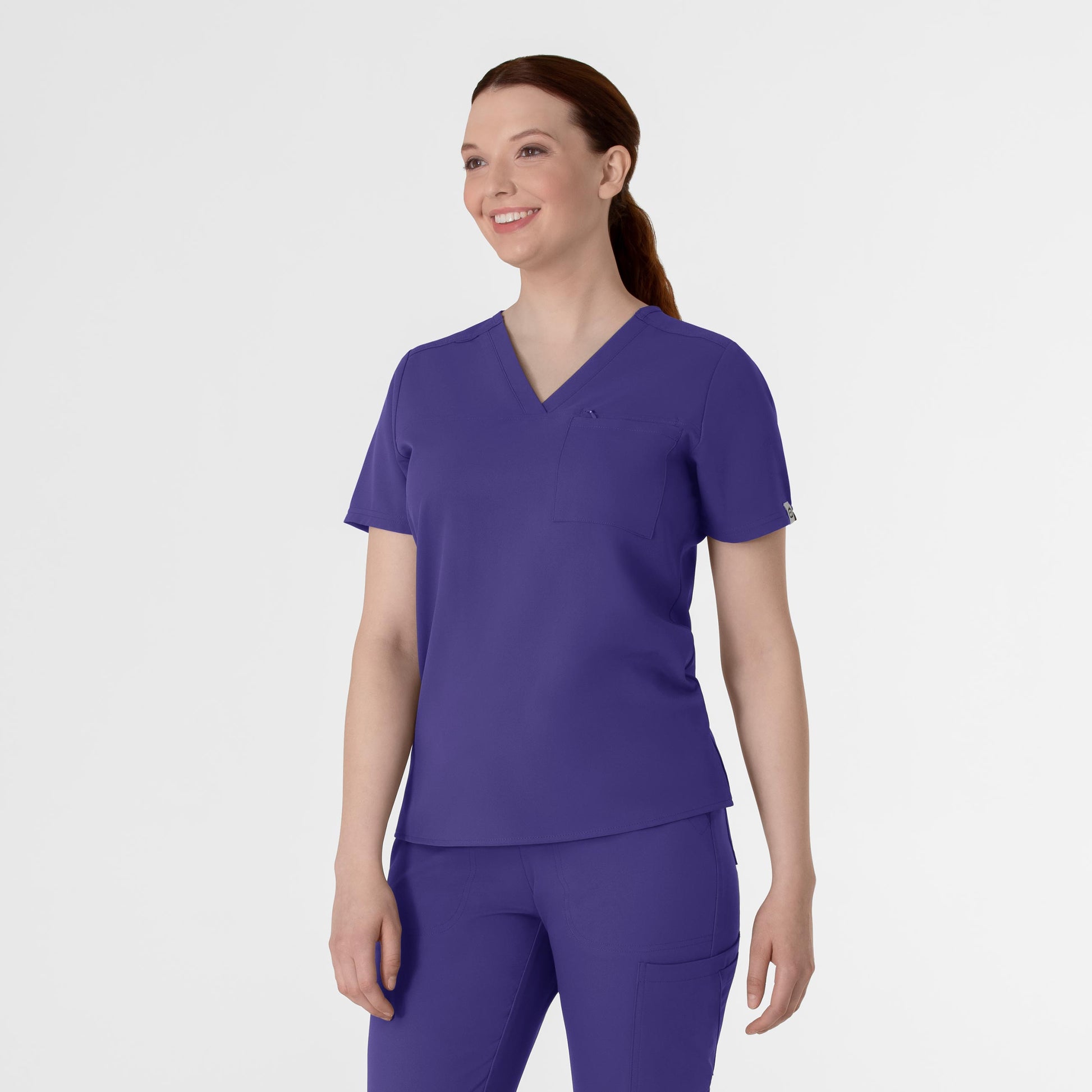 Thrive 6222 V-Neck Tuck-In Scrub Top Grape Model Image Right Side | Wink