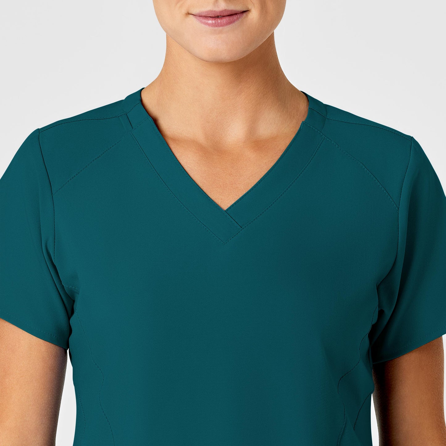 W123 6155 Stylized V-Neck Scrub Top Caribbean Blue Model Image Left Side | Wink