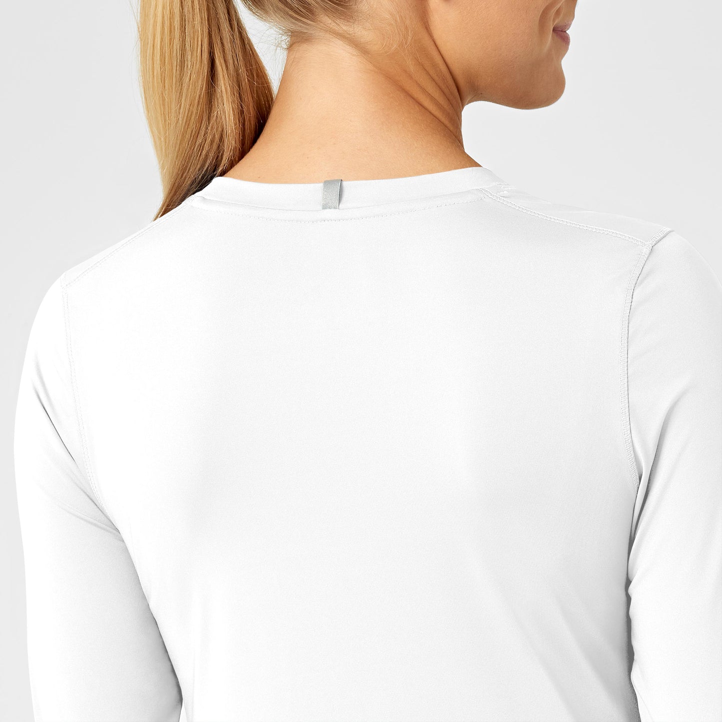 Layers 2029 Performance Long Sleeve Tee White Model Image Alternate | Wink