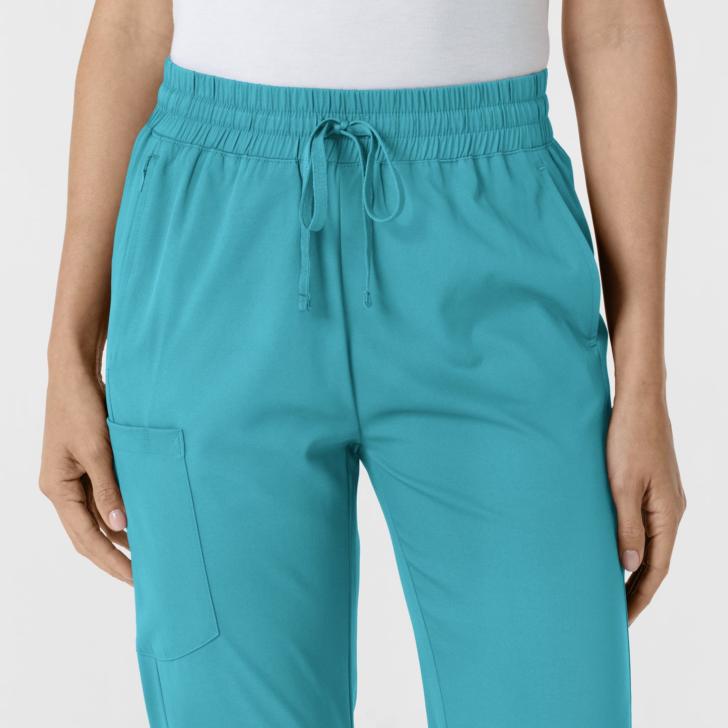 Boundless 5251 Bootcut Scrub Pants Teal Model Image Left Side | Wink