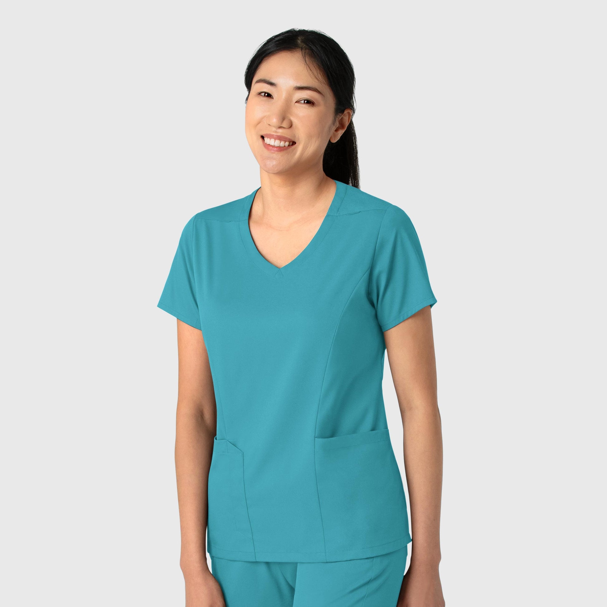 Boundless 6251 2-Pocket V-Neck Scrub Top Teal Model Image Right Side | Wink