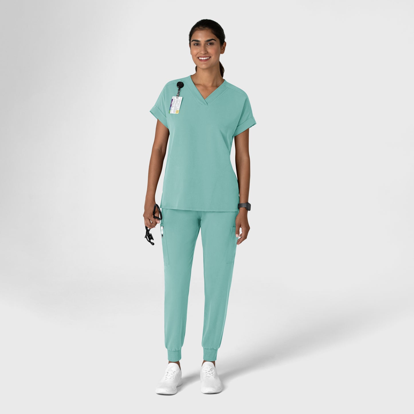 Nova 5132 Jogger Utility Scrub Pant Turquoise Model Image Right Side | Wink