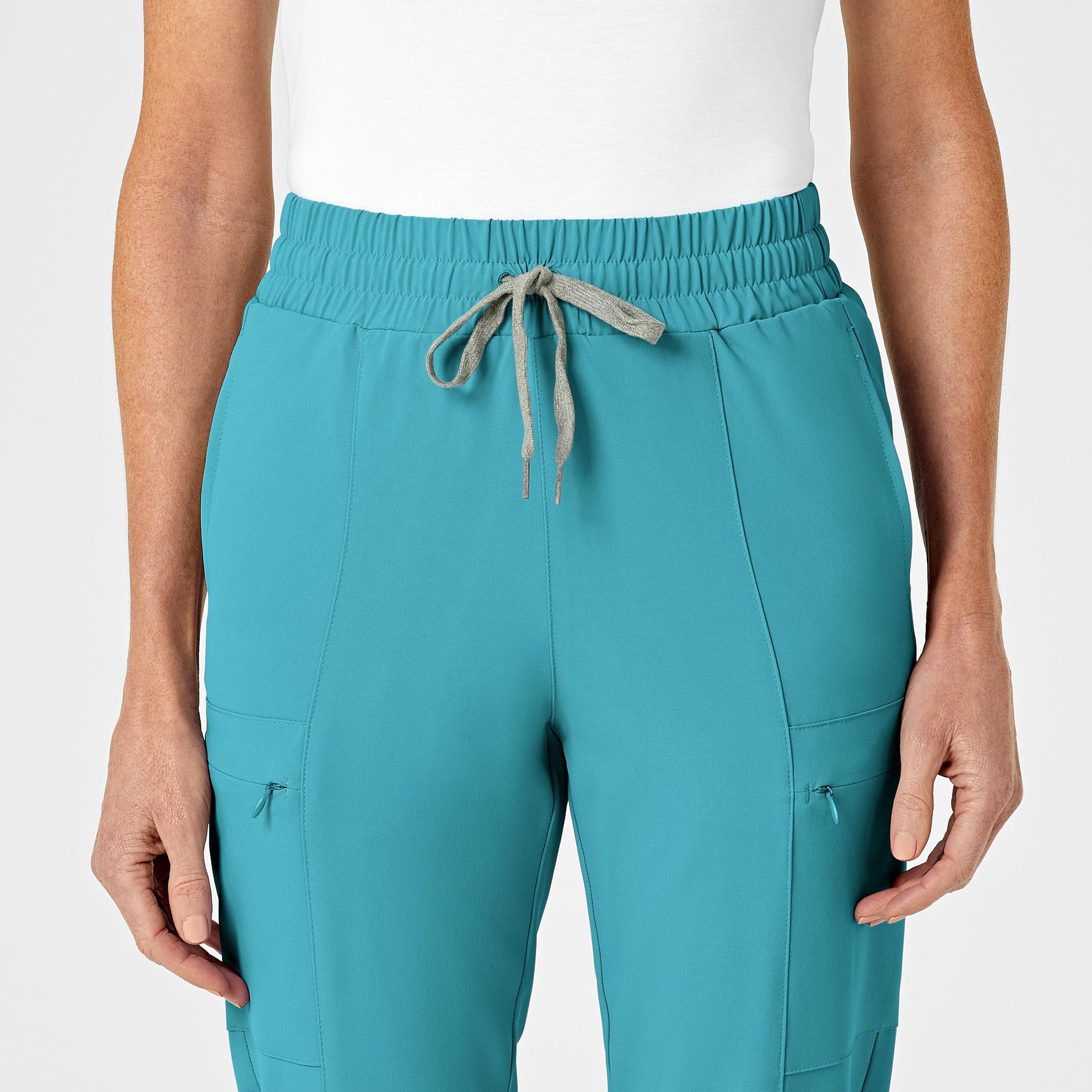 RENEW 5334 High Waist Slim Leg Scrub Pants Teal Blue Model Image Left Side | Wink