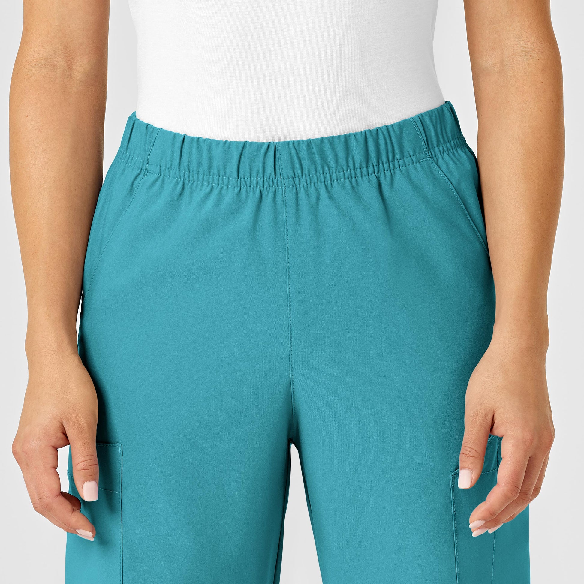 W123 5855 Unisex Multi-Cargo Scrub Pants Teal Blue Model Image Left Side | Wink