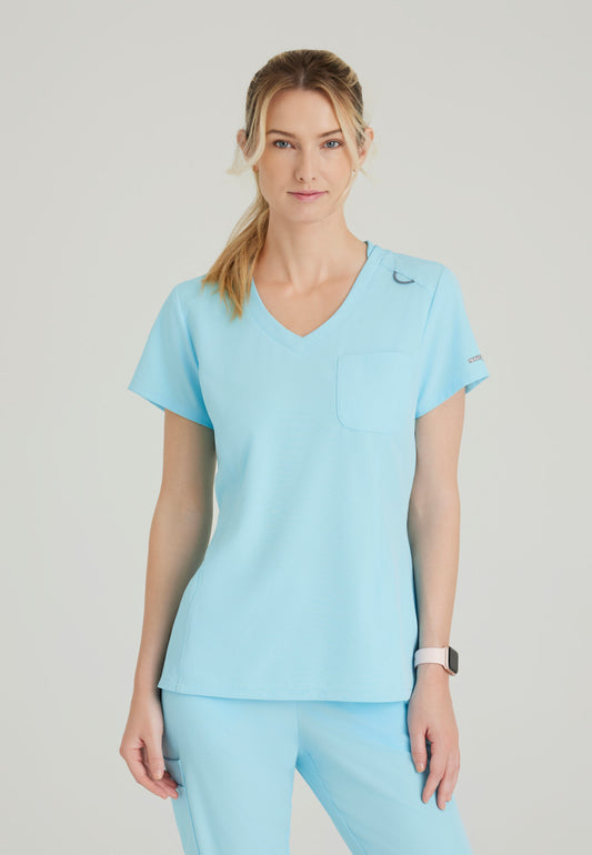 Skechers SKT147 Dignity Scrub Top Poolside Blue Model Image Front | Barco