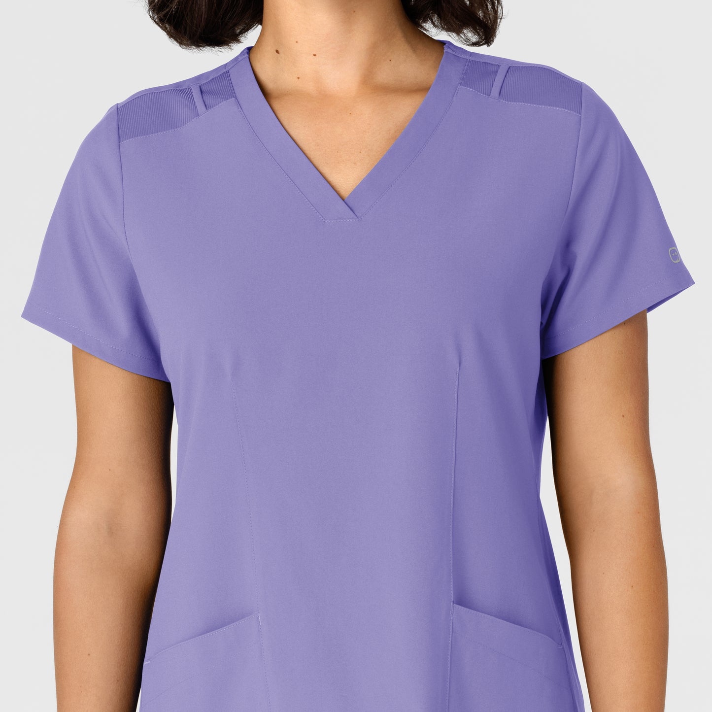 W123 6145 Flex-n-Reach Side Panel V-Neck Scrub Top Iris Purple Model Image Left Side | Wink