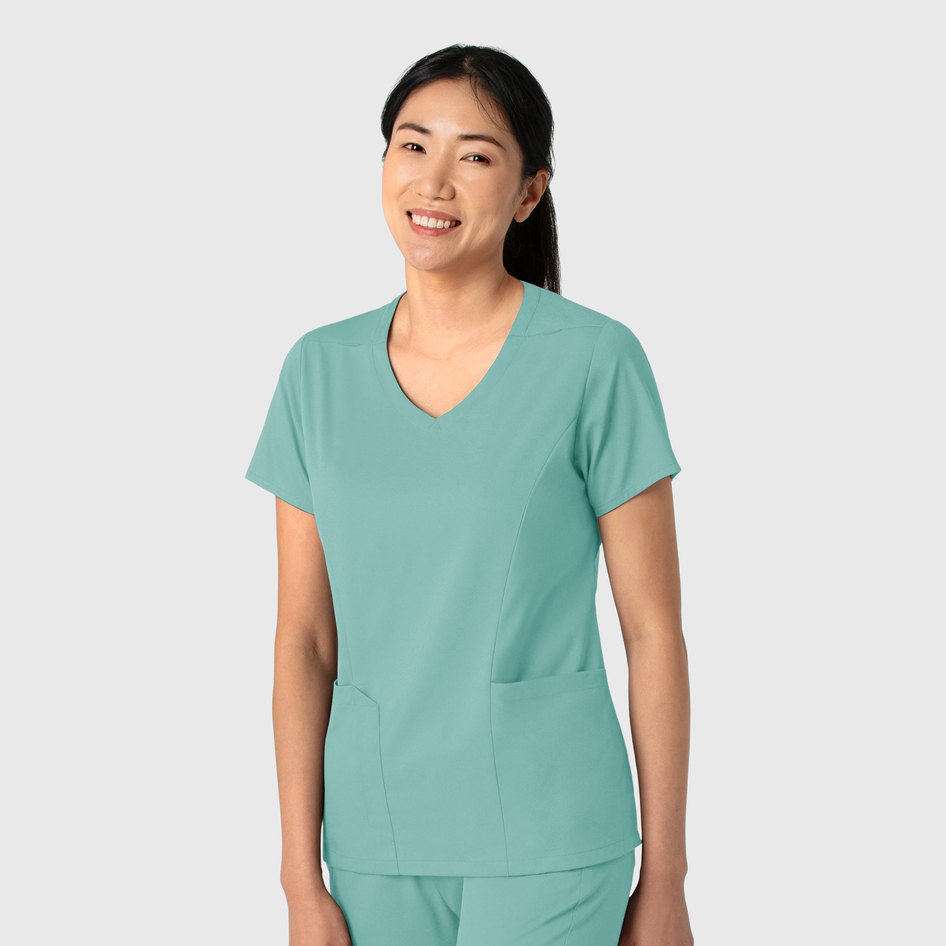 Boundless 6251 2-Pocket V-Neck Scrub Top Turquoise Model Image Right Side | Wink