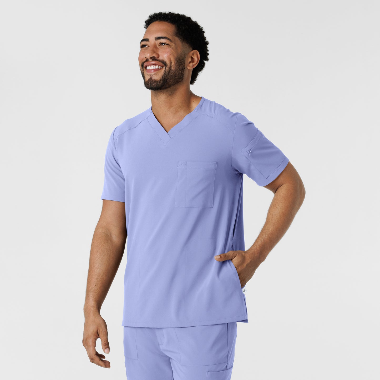 RENEW 6834 Men's V-Neck 5 Pocket Scrub Top Ceil Blue Model Image Right Side | Wink