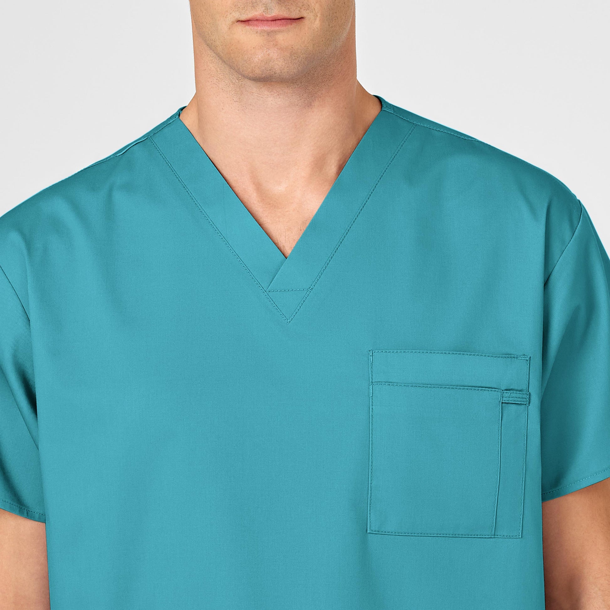 WonderWORK 100 Unisex V-Neck Scrub Top Teal Blue Model Image Alternate | Wink