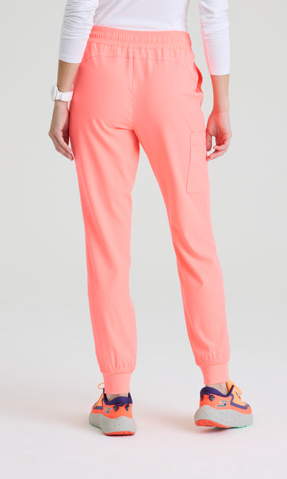 Skechers SKP552 Women's Theory Jogger in Coral Fizz by Barco Model Image Back