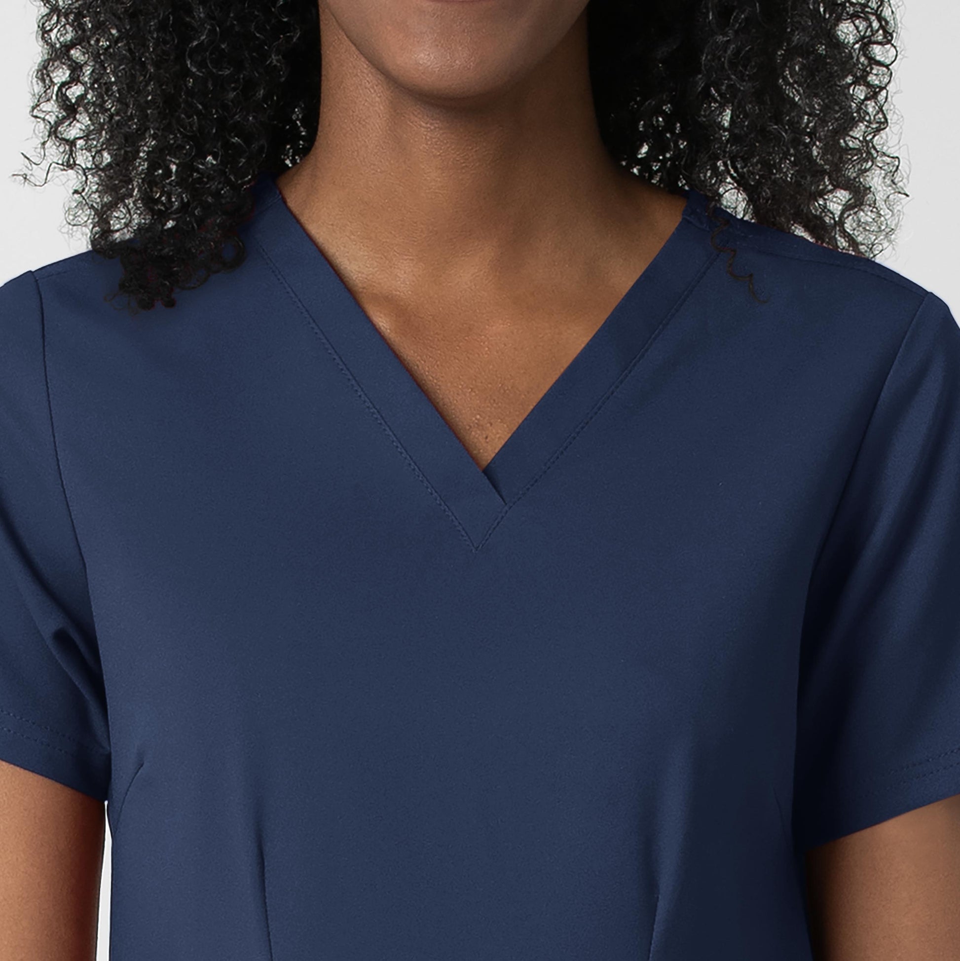 Thrive 6122 Fitted 3-Pocket V-Neck Scrub Top Navy Model Image Left Side | Wink