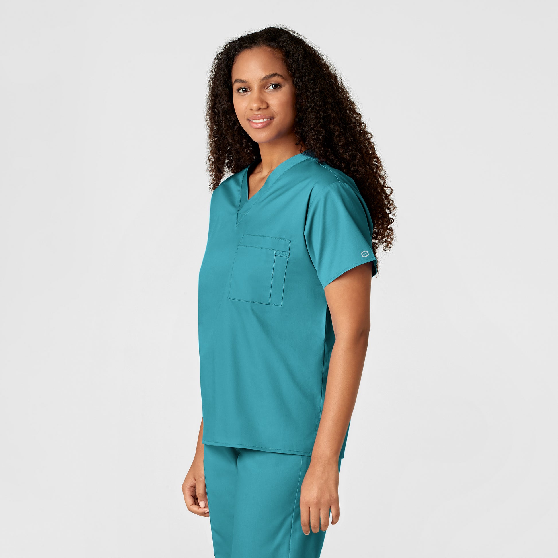 WonderWORK 100 Unisex V-Neck Scrub Top Teal Blue Model Image Right Side | Wink