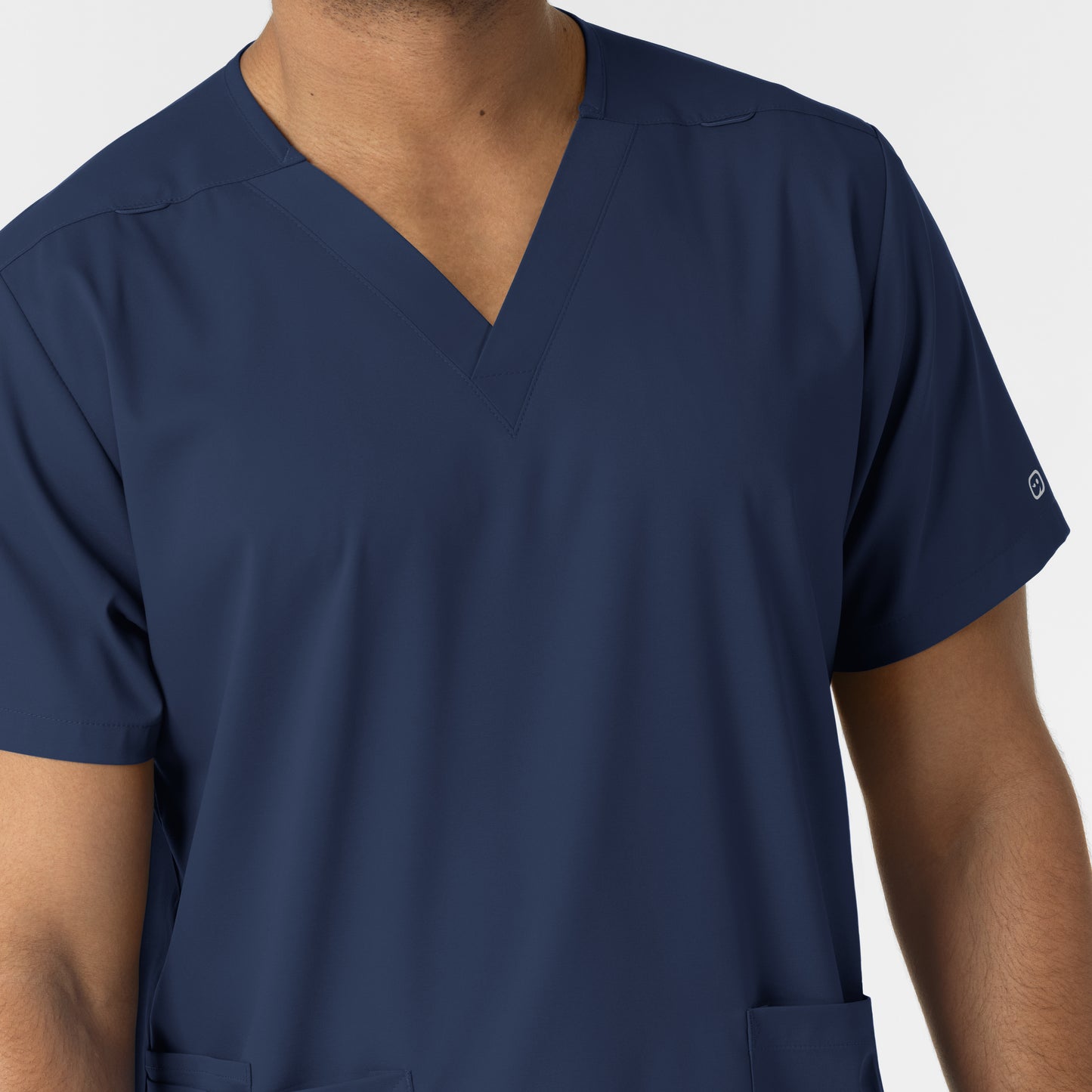 Boundless 6051 Unisex V-Neck Scrub Top Navy Model Image Left Side | Wink