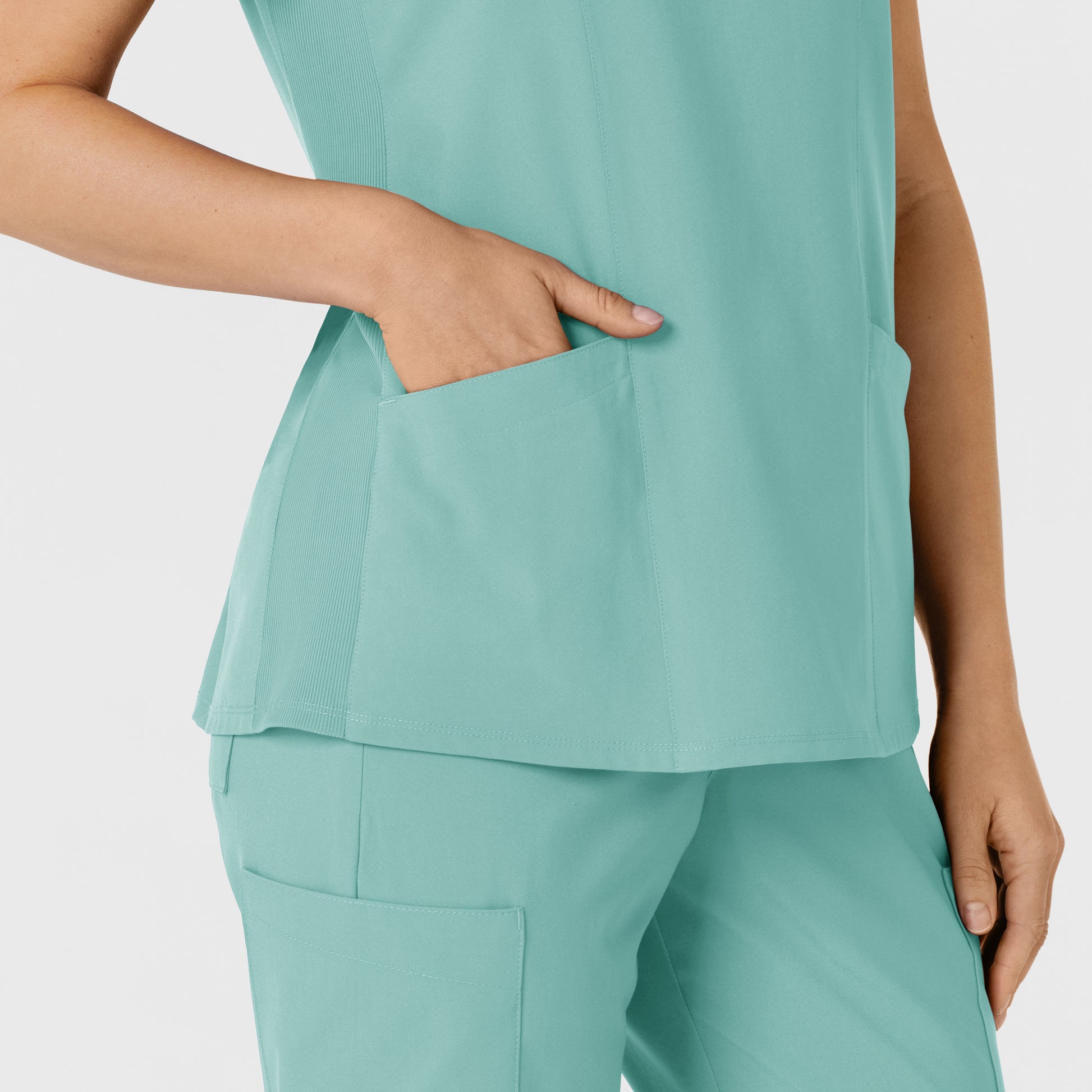 W123 6145 Flex-n-Reach Side Panel V-Neck Scrub Top Turquoise Model Image Alternate | Wink