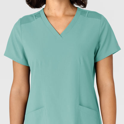 W123 6145 Flex-n-Reach Side Panel V-Neck Scrub Top Turquoise Model Image Left Side | Wink