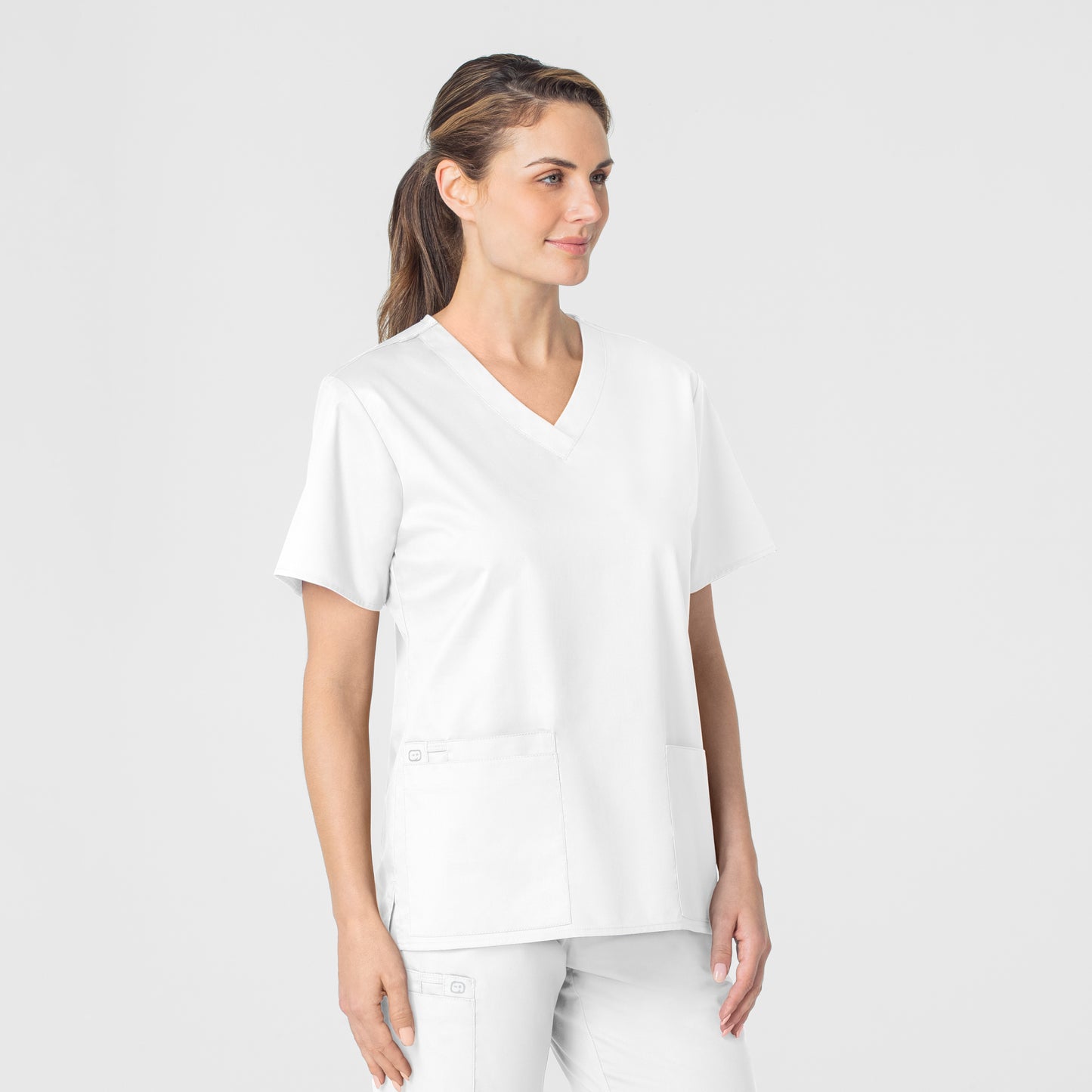 WonderWORK 101 V-Neck Scrub Top White Model Image Left Side | Wink