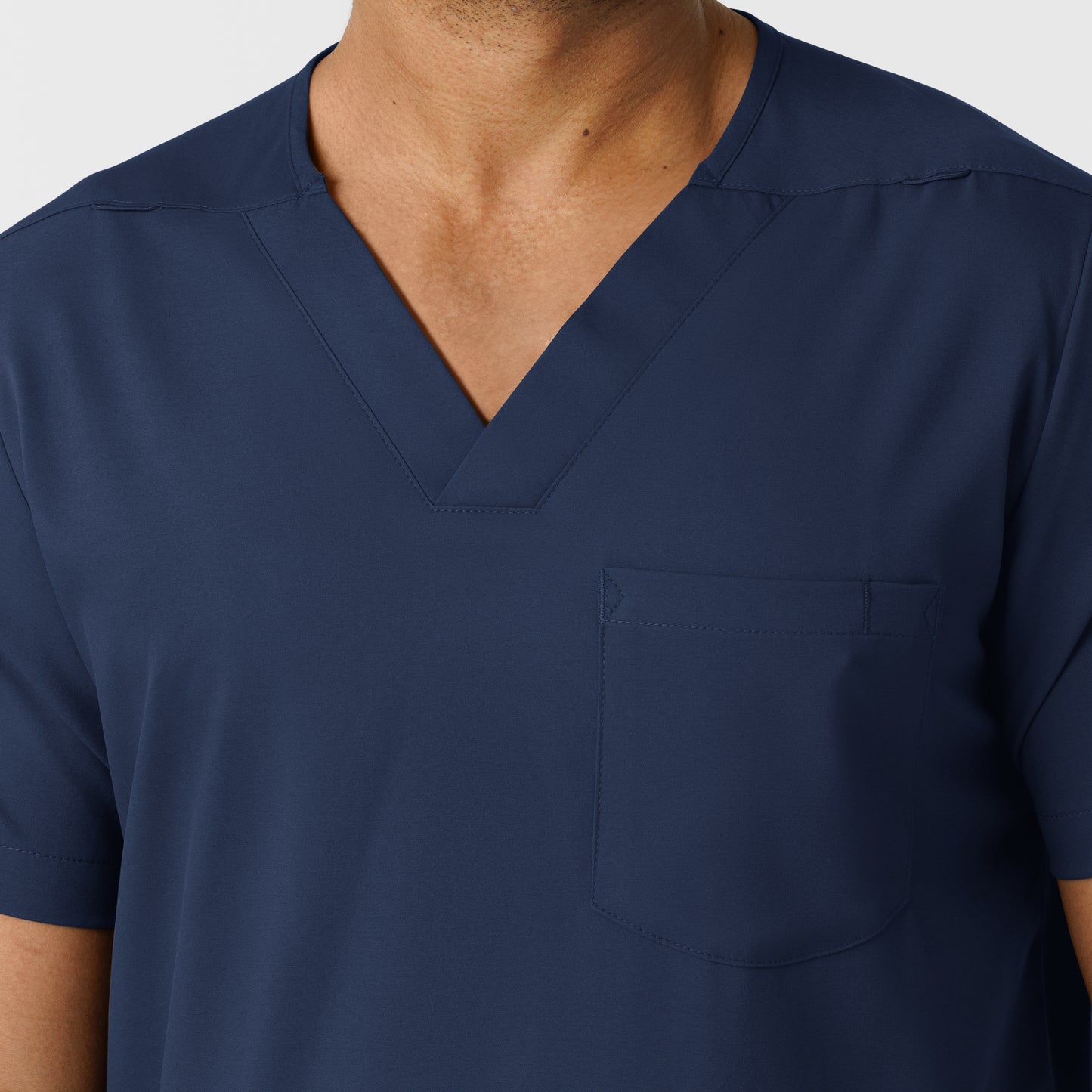 Boundless 6351 Men's Multi Pocket V-Neck Scrub Top Navy Model Image Left Side | Wink