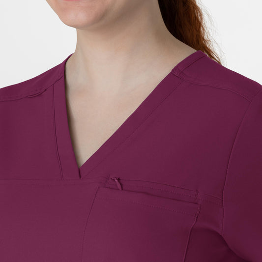 Thrive 6222 V-Neck Tuck-In Scrub Top Wine Model Image Left Side | Wink