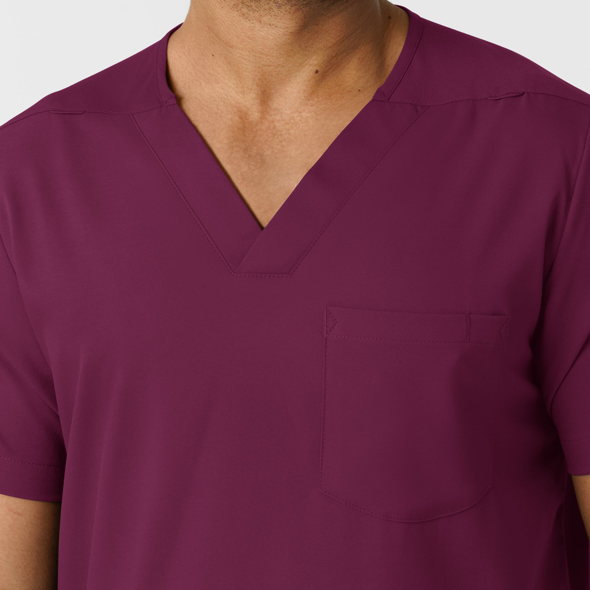 Boundless 6351 Men's Multi Pocket V-Neck Scrub Top Wine Model Image Left Side | Wink