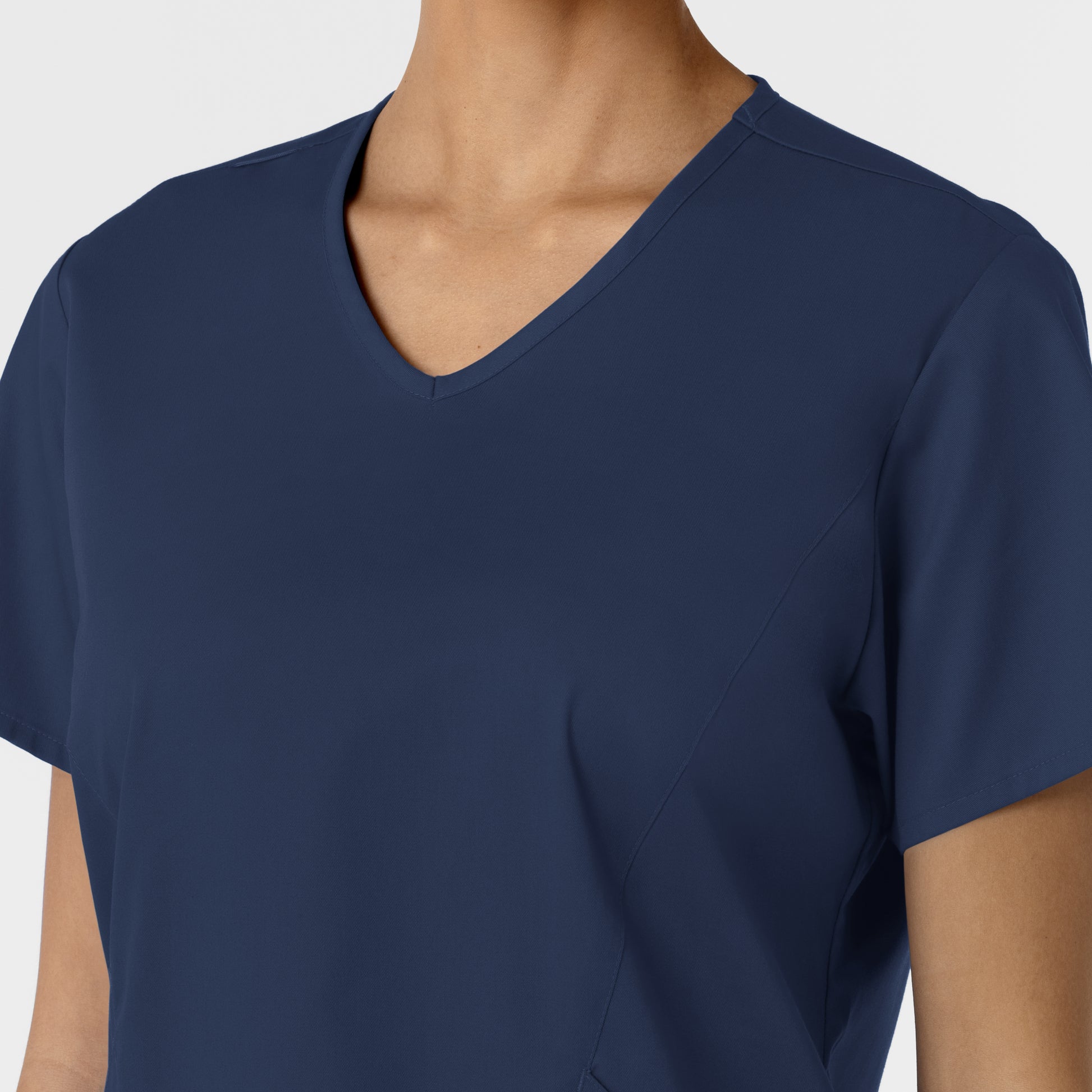 WonderWORK 106 Curved V-Neck Scrub Top Navy Model Image Left Side | Wink