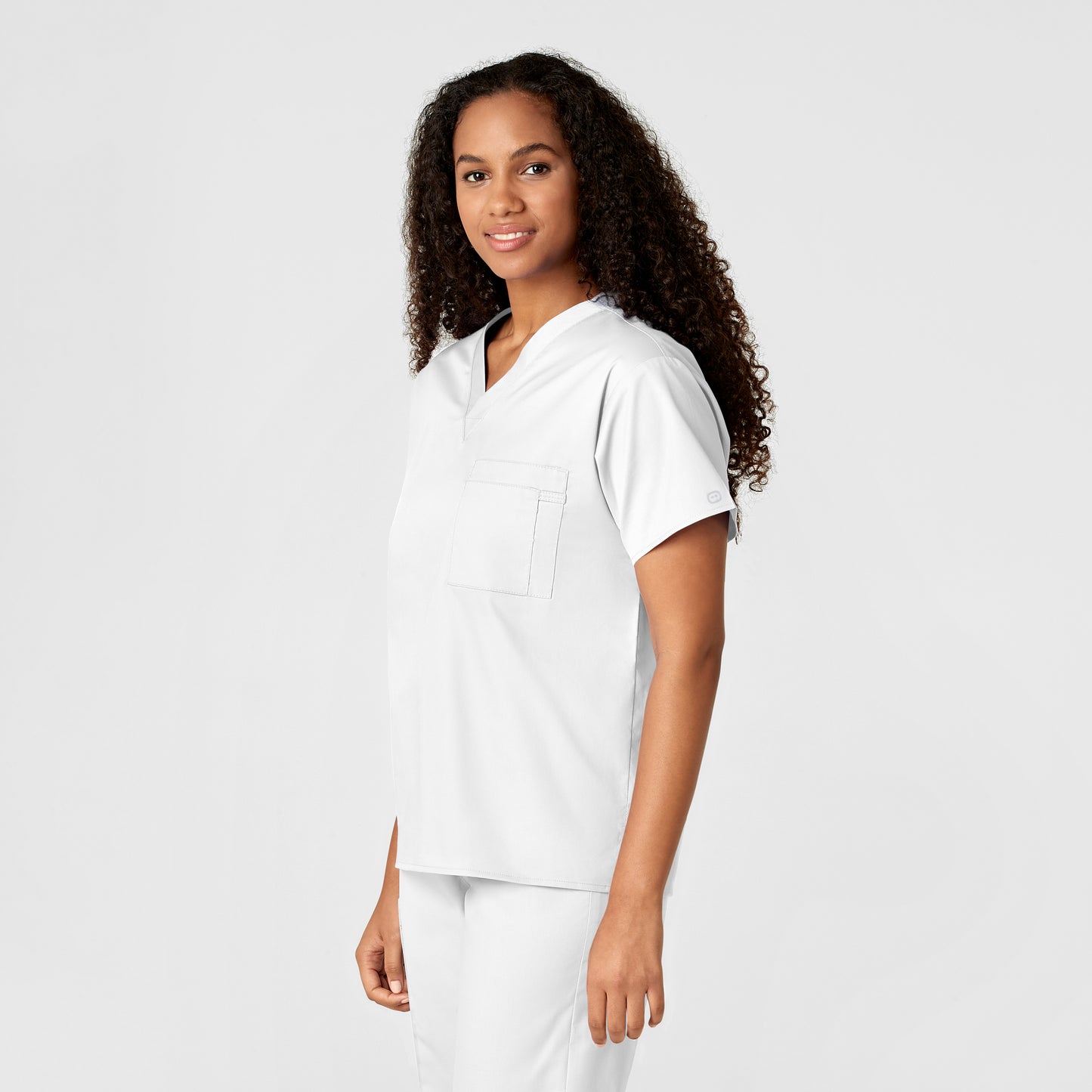 WonderWORK 100 Unisex V-Neck Scrub Top White Model Image Left Side | Wink