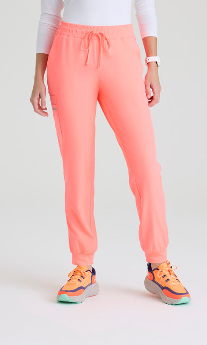 Skechers SKP552 Women's Theory Jogger in Coral Fizz by Barco Model Image Front